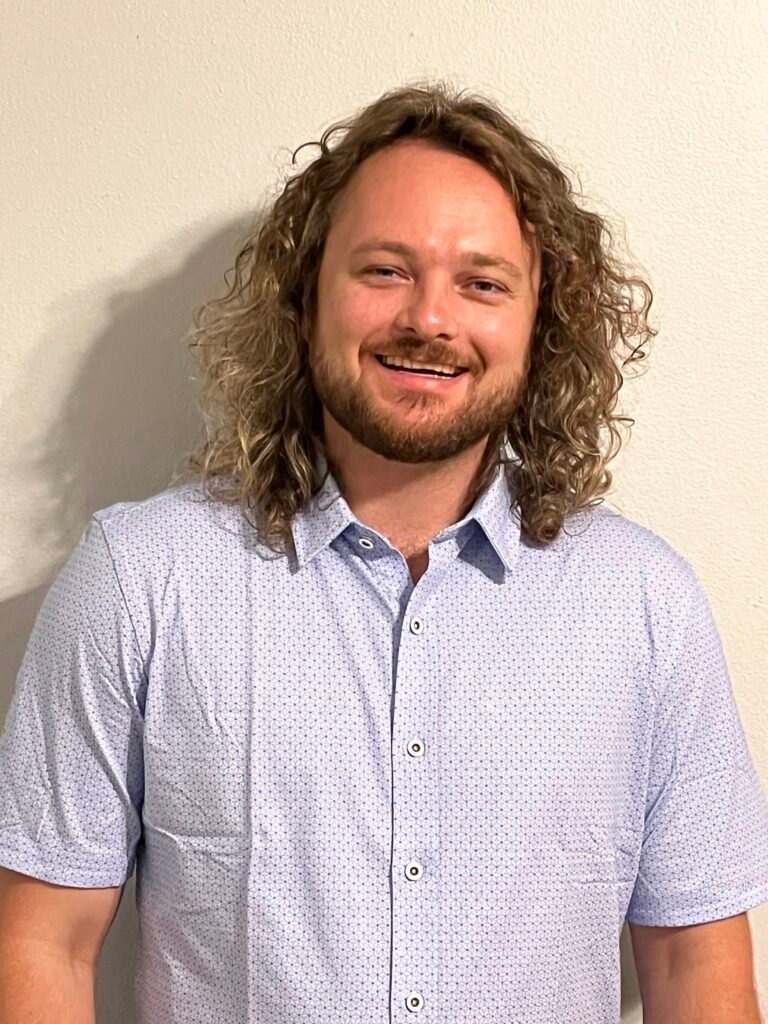 Zack Rehfuss Headshot